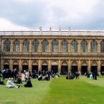 Trinity College, Cambridge University graduation picnic in the Great Court with graduate students and their families.