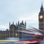 Big Ben and Palace of Westminster in the early morning, red buse