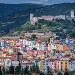 Colorful houses in the old village known as Sa Costa adorn the h