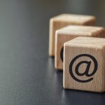 Wooden dices with internet at symbol