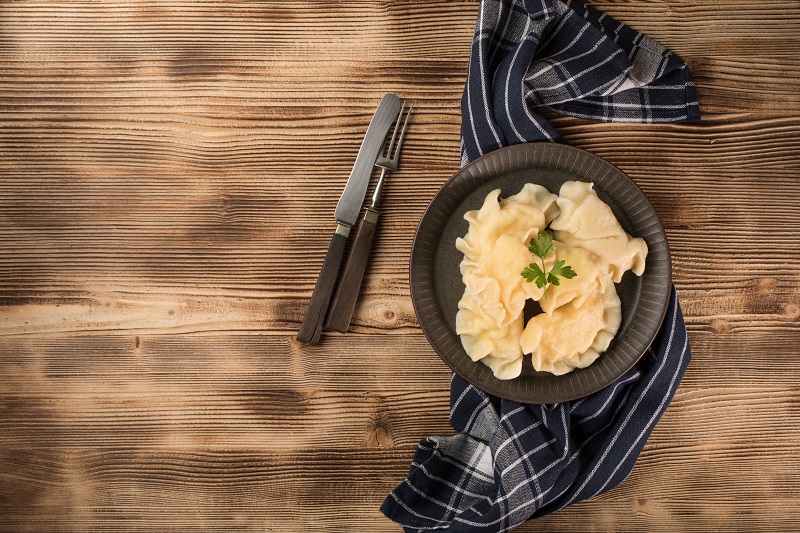 Appetizing traditional East Europe dumplings (pierogi) with cheese.