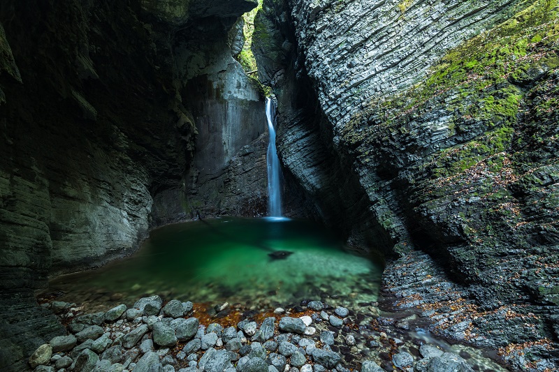 Waterfall Kozjak hidden in cave ,Slovenia
