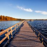 beautiful-wooden-walkway-over-a-lake-in-finland