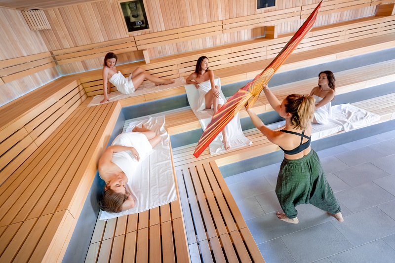 Sauna master making ritual in Finnish sauna