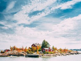 Top 7 Interesting Facts About Finland Suomi Or Finland. Beautiful Red Finnish Wooden Log Cabin House O