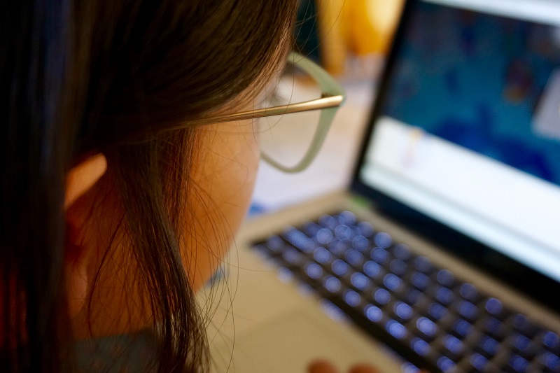 student-typing-on-laptop-remote-learning-homeschool